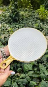 Ceramic round shapped platter with handle