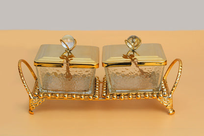 Glass bowl with metal stand and 2 spoon set