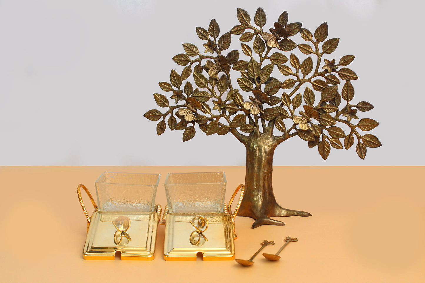 Glass bowl with metal stand and 2 spoon set