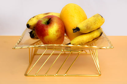 Glass fruit bowl with metal stand